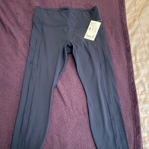 NWT Athleta Ultimate Stash 7/8 tight.